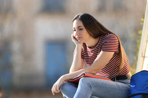 Young Woman Sitting