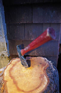 Axe in Wood Stump